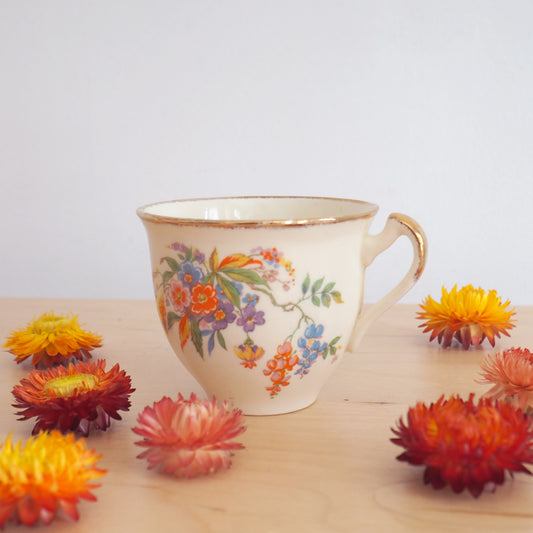 Bougie fleurs multicolores parfum au choix, dans une tasse de collection